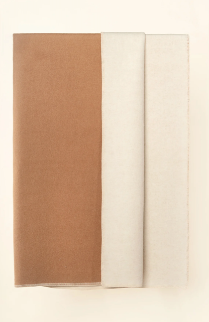 Camel & ivory folded blankets