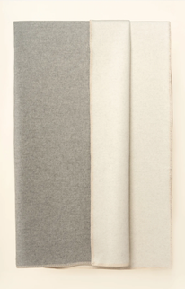 Grey & ivory folded blankets
